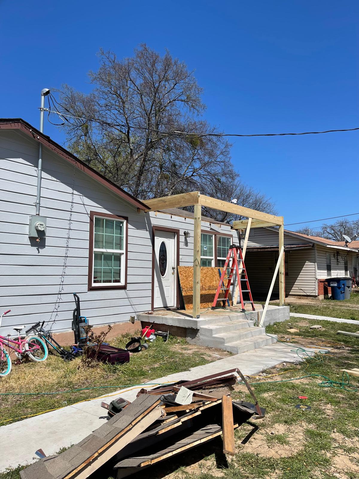 Front porch framing and new concrete steps under construction