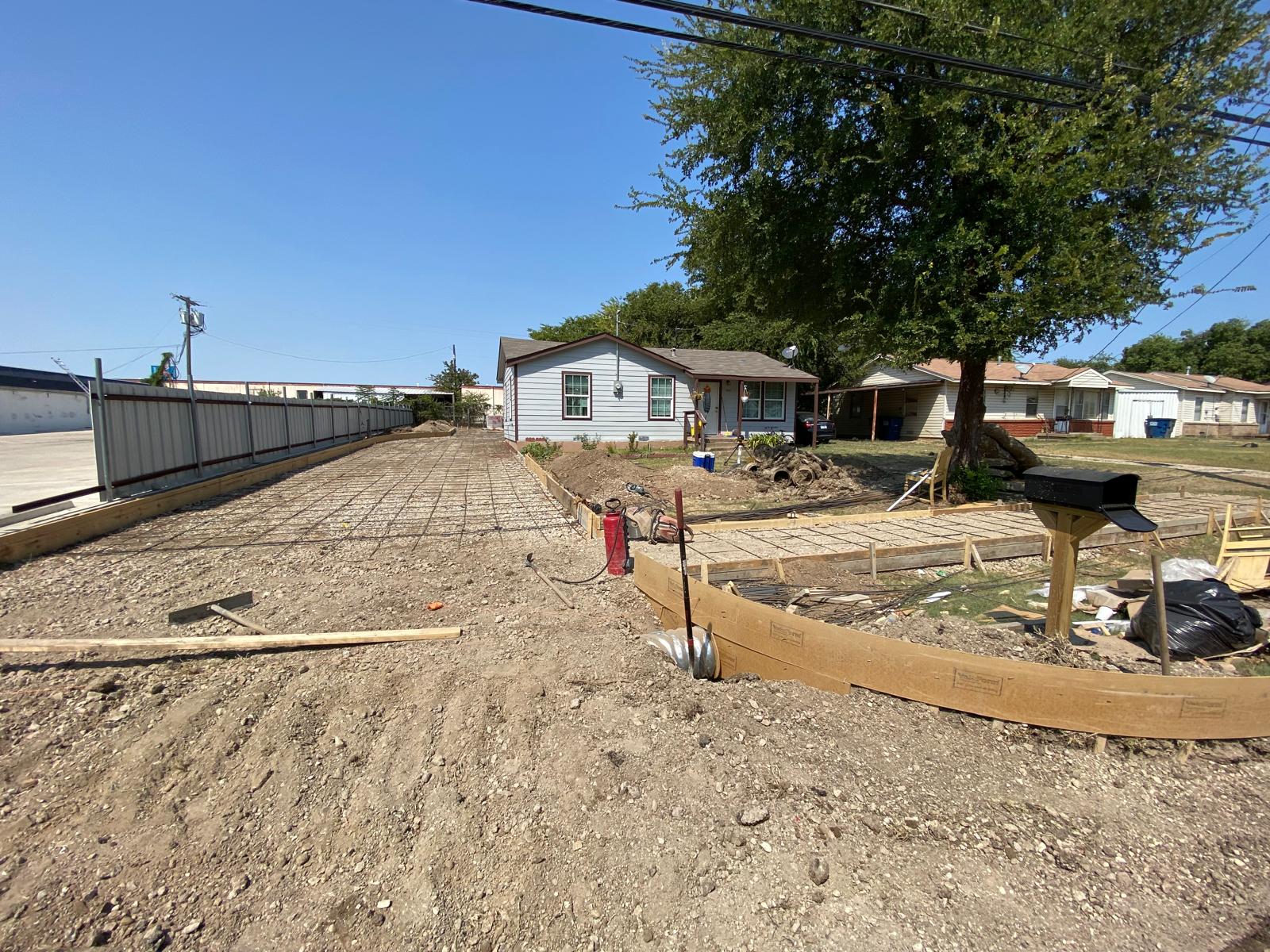 New driveway and walkway concrete forms prepared for pour